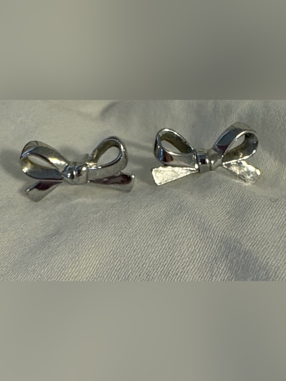 Kate Spade Silver “Skinny Mini” Bow Earrings